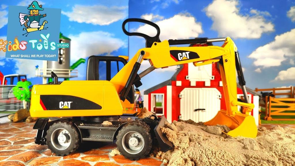 'Video thumbnail for Bruder Cat Yellow Wheel Excavator 02445 / 02446 demo'