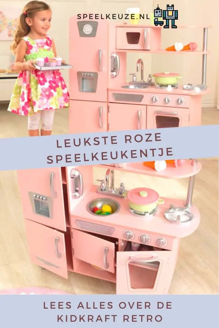 Girl plays with a pink play kitchen from Kidkraft