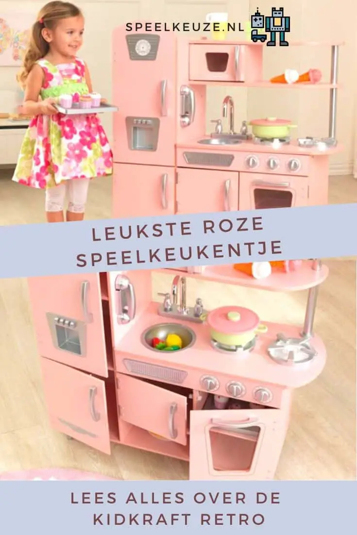 Meisje speelt met een roze speelkeukentje van Kidkraft