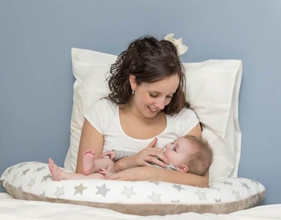 Snoozzz nursing pillow to help your baby sit