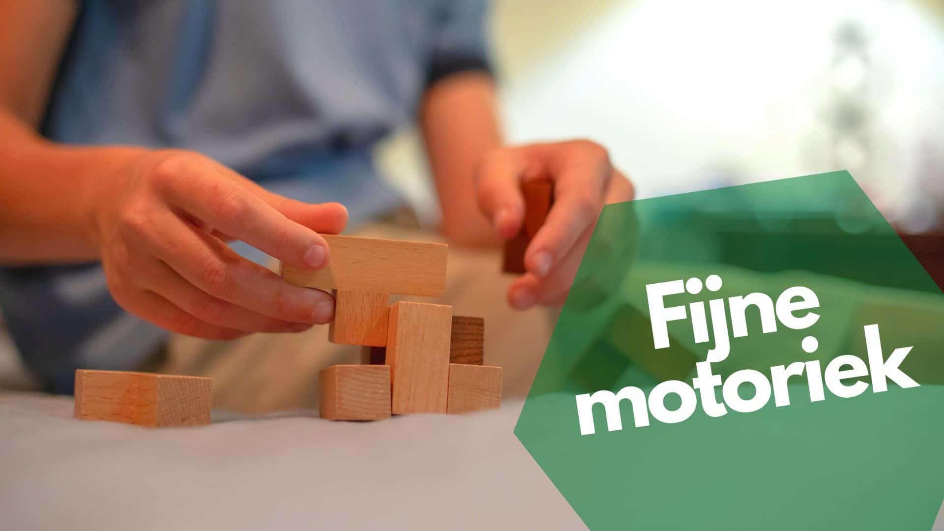 Child plays with blocks to stimulate fine motor skills