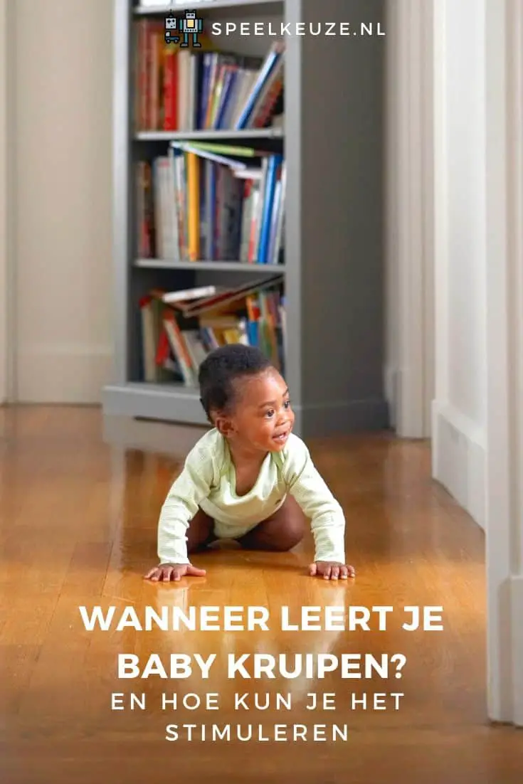 Baby learns to crawl on a wooden floor in the hallway