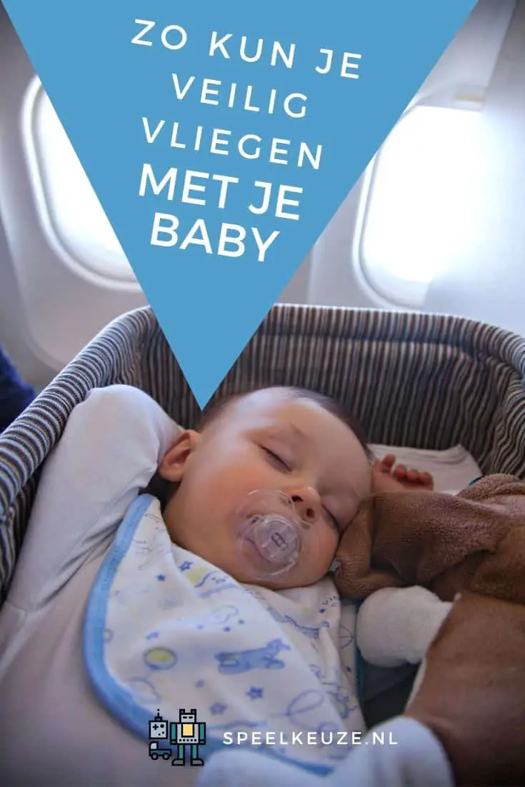 Photo of a baby sleeping in a cot on an airplane