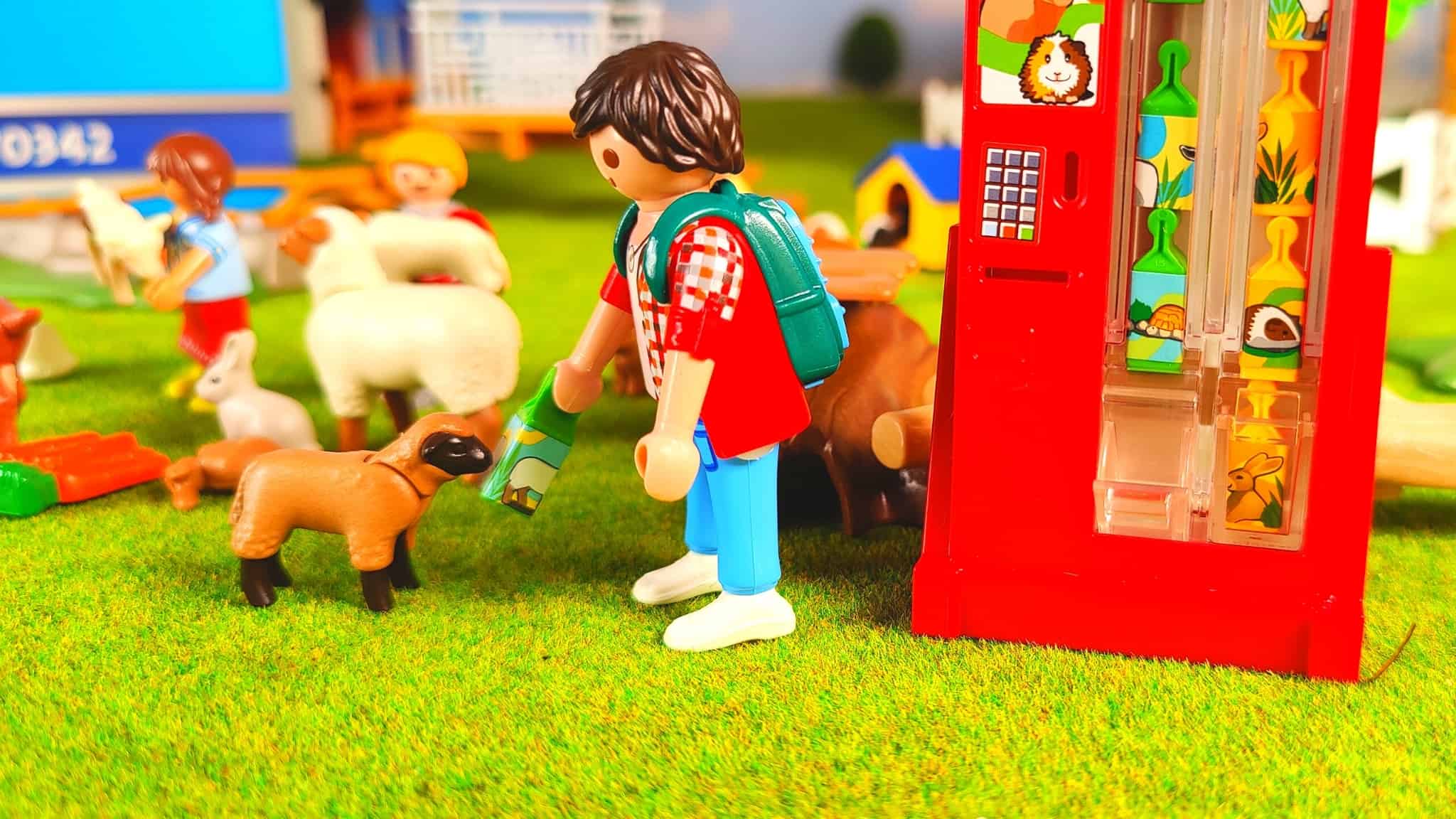 Get food from the vending machine at the petting zoo