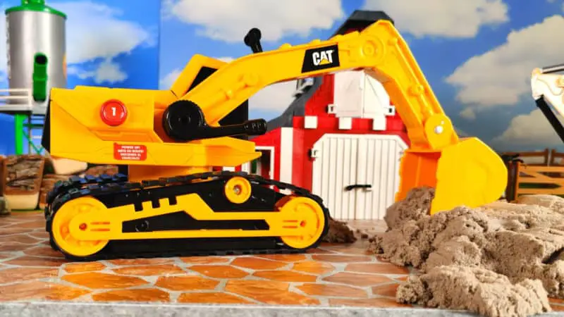 Cat Construction Power Haulers digs in kinetic sand