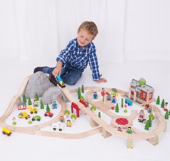 Best train track set for toddler boy- Train track set BigJigs with little boy