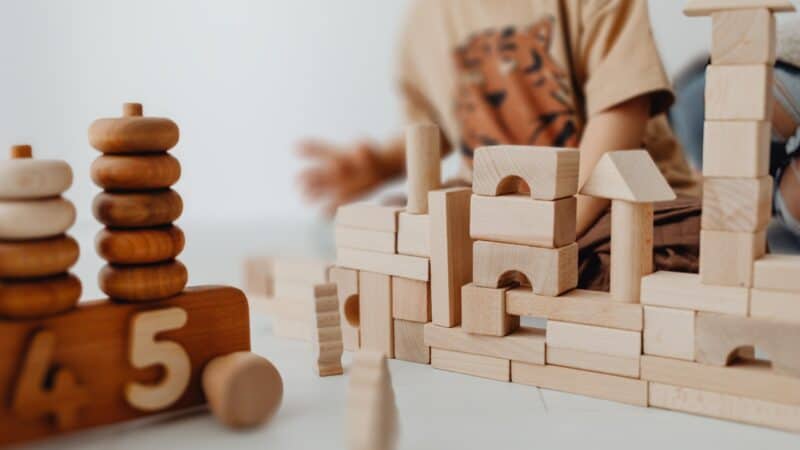 Playing with wooden blocks