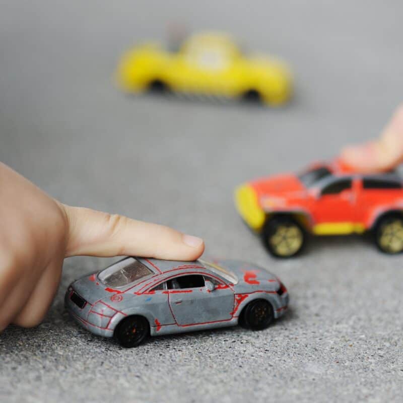 What do children learn from playing with toy cars