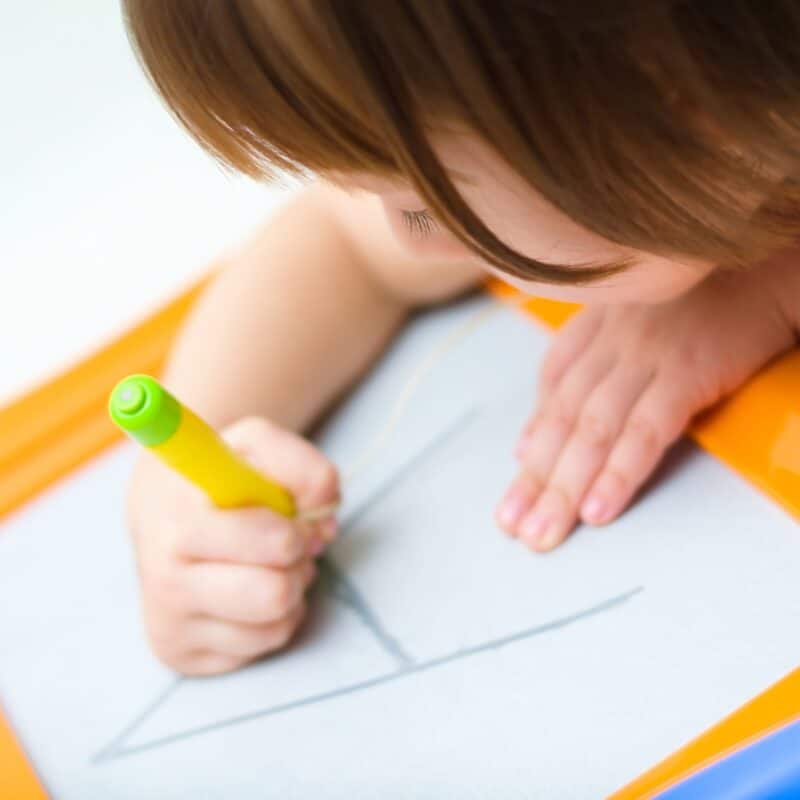 How do children learn to write