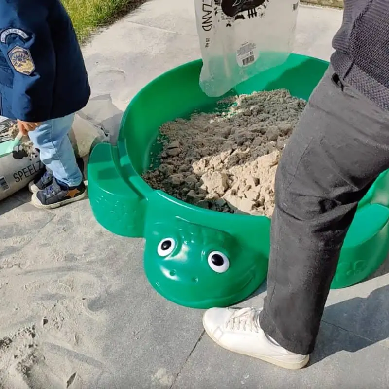 Little Tikes Fill the turtle sandbox with sand