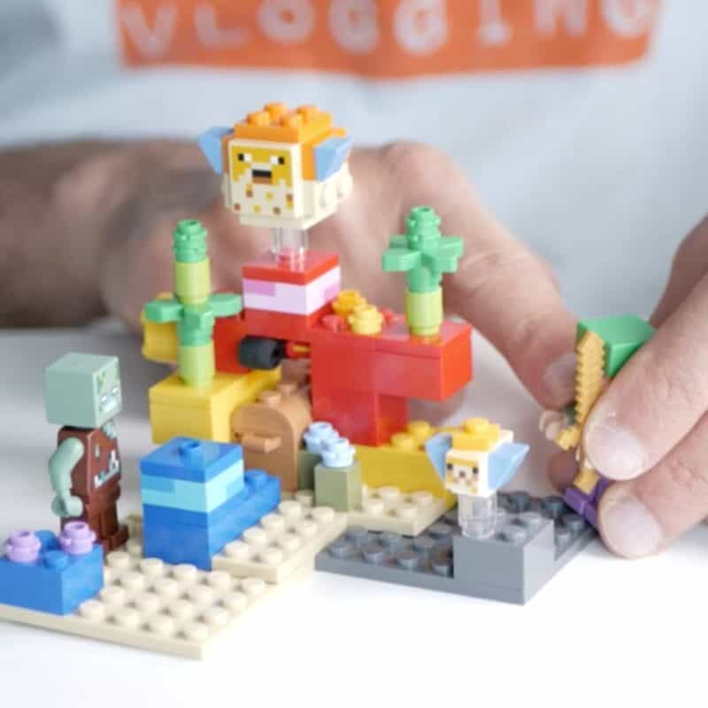 I point out Alex in the Coral Reef Lego playset